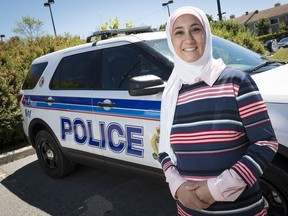 Aisha Sherazi suggests that the Ottawa police service offer regular ride-alongs to ordinary citizens as an active outreach program. (Errol McGihon/Postmedia)