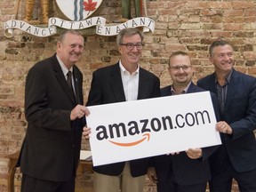 Ottawa councillor for Orleans Ward Bob Monette, Mayor Jim Watson, Cumberland Ward councillor Stephen Blais, and Beacon Hill-Cyrville Ward councillor Tim Tierney after officially announcing that Amazon will be building a large fulfillment centre in the east end of the city. July 10, 2018.