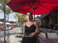 Antonella Papalia in front of the patio of La Roma restaurant on Preston Street. Errol McGihon/Postmedia