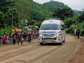 CHIANG RAI, THAILAND - JULY 9: An ambulance leaves the scene near Tham Luang Nang Non cave in the early hours on July 9, 2018 in Chiang Rai, Thailand. Divers began an effort to pull the 12 boys and their soccer coach on Sunday morning after they were found alive in the cave at northern Thailand. Videos released by the Thai Navy SEAL shows the boys, aged 11 to 16, and their 25-year-old coach are in good health in Tham Luang Nang Non cave and the challenge now will be to extract the rest of the party safely.