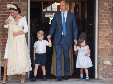 LONDON, ENGLAND - JULY 09: Catherine Duchess of Cambridge and Prince William, Duke of Cambridge with their children Prince George, Princess Charlotte and Prince Louis after Prince Louis' christening at St James's Palace on July 09, 2018 in London, England.