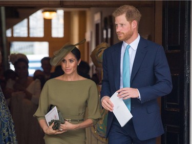 LONDON, ENGLAND - JULY 09: The Duke and Duchess of Sussex depart after attending the christening of Prince Louis at the Chapel Royal, St James's Palace on July 09, 2018 in London, England.