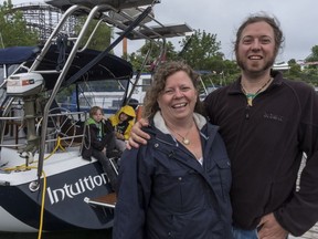 Carole Plouffe, her husband Benoit Plamondon, and their two young kids, 12-year-old Ludvik, in yellow, and eight-year-old Kilian, are living on a sailboat in the La Ronde marina in Montreal before leaving for their year-long adventure in September.