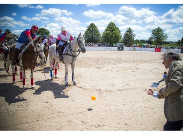 Eugenio Maria Curia, Ambassador of Argentina, threw out the first ball of the polo match.