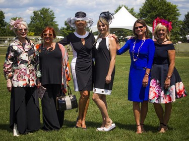 From left, Denise Blais, Marie Jose Poirier, Manja Mackley, Melanie Mason, Deborah Taylor and Leslie Hine were models wearing Three Wild Women's clothing during the fashion show.