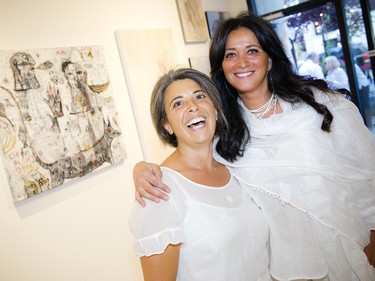 Donna Henhoeffer, chef for the evening, and Carole Saad of LouLou Lounge, who supplied the furniture for the event.