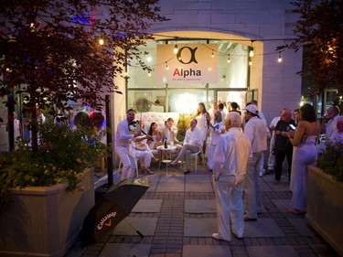 Alpha Art Gallery held White Vernissage Thursday, July 26, a beautiful dinner on the courtyard in front of the art gallery. Guests were all asked to wear white.