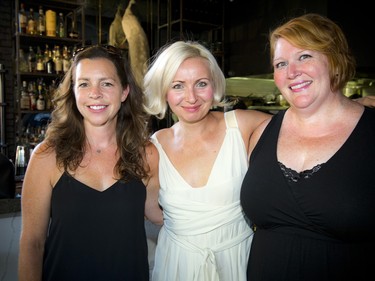 From left, Tara Reid, corporate events administrator at CHEO Foundation; Edith Betkowski, director of Alpha Gallery; Stephanie Egan, communications specialist at CHEO Foundation.