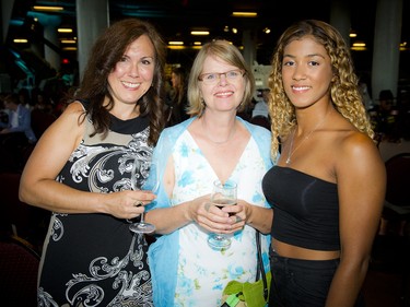 From left, Lara Mainville, Kim Nesbitt and her daughter Lila Nesbitt, a model in the show.