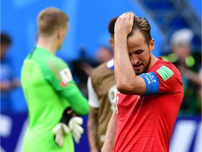 English captain Harry Kane reacts to his team's loss to Belgium at St. Petersburg on Saturday.