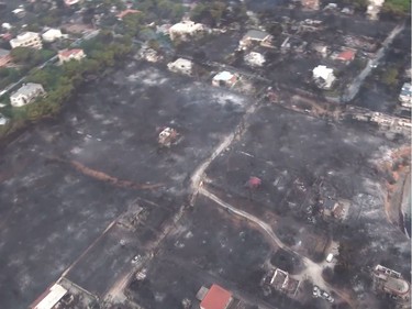 This handout picture released by the Hellenic Ministry of Defence on July 24, 2018 shows an aerial view of an urban area burnt following fire in Mati.
