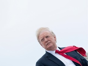 US President Donald Trump boards Air Force One at Andrews Air Force Base, MD, on July 27, 2018.