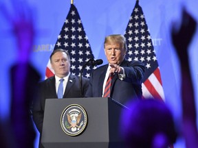 U.S. President Donald Trump answers points his finger during a press conference after a summit of heads of state and government at NATO headquarters in Brussels, Belgium, Thursday, July 12, 2018. NATO leaders gather in Brussels for a two-day summit.