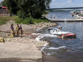 Gatineau firefighters towed the damaged boat to shore at the Hull Marina and extinguished the remaining flames.