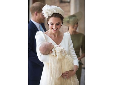 Kate, Duchess of Cambridge carries Prince Louis as they arrive for his christening service at the Chapel Royal, St James's Palace, London, Monday, July 9, 2018. (Dominic Lipinski/Pool Photo via AP) ORG XMIT: LLT114