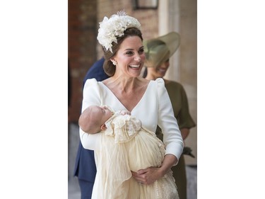 Kate, Duchess of Cambridge carries Prince Louis as they arrive for his christening service at the Chapel Royal, St James's Palace, London, Monday, July 9, 2018. (Dominic Lipinski/Pool Photo via AP) ORG XMIT: LLT111