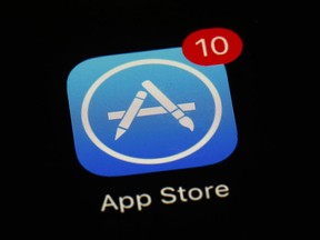 FILE - This March 19, 2018 file photo shows Apple's App Store app in Baltimore. Since its debut 10 years ago Tuesday, July 10, 2018, Apple's app store has unleashed new ways for us to work, play, and become lost in our screens.