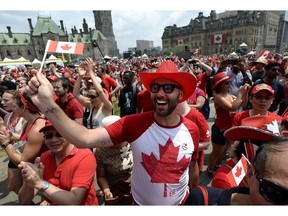 People braved the heat for Canada Day celebrations on Parliament Hill in Ottawa on Sunday, July 1, 2018.
