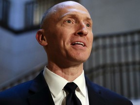 Carter Page speaks with reporters following a day of questions from the House Intelligence Committee on Capitol Hill in Washington. A new congressional memo alleging FBI surveillance abuse is being used to undermine the legitimacy of special counsel Robert Mueller’s Russia investigation. But included in the four-page document are revelations that might complicate the effort.