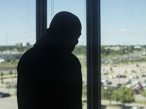 Agibola, a Nigerian migrant is pictured at Centennial College residency where he is being temporarily housed in Toronto on Friday, July 6, 2018.