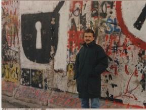 File photo of Chris Cobb in front of the Berlin Wall in 1989.