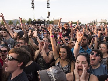 Crowd reacts to the Canadian rock band Three Days Grace as they perform on the main stage on the last day of Bluesfest in Ottawa on July 15, 2018.