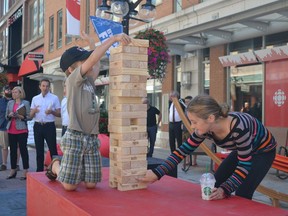 Johnny, 7, and Lottie Jeffrey, 11, were enjoying the new "SparksScape" Jenga game on Sparks Street.