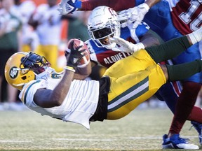 Edmonto Eskimos' C.J. Gable dives in for a touchdown during first half CFL football action against the Montreal Alouettes in Montreal, Thursday, July 26, 2018.