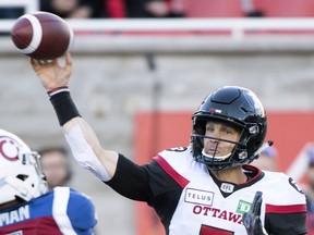 Redblacks quarterback Trevor Harris throws a pass during the first half of Friday's game against the Alouettes. Harris finished the contest with three touchdown passes.