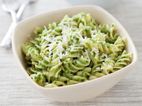 Pasta with kale and sunflower seed pesto. This recipe appears in the cookbook "Cooking At Home With Bridget And Julia."