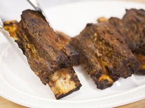 Grill-roasted beef short ribs.  This recipe appears in the cookbook "Master Of The Grill."