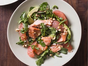 Ssalmon, avocado, grapefruit and watercress salad. This recipe appears in the cookbook "Dinner Illustrated."