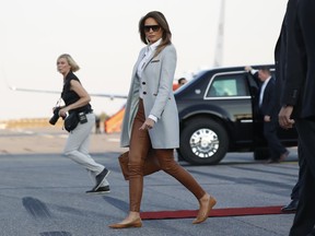 Melanie Trump walks to the car after she arrived with U.S. President Donald Trump at the airport in Helsinki, Finland, Sunday, July 15, 2018 on the eve of his meeting with Russian President Vladimir Putin.