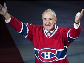 Former Montreal Canadiens defenceman Guy Lapointe, seen here in a file photo from 2014, is the father of a Sûreté du Québec spokesman with the same name, and both, according to police, have been targeted by the threats.