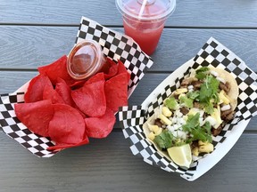 House-made chips, fire-roasted salsa, tacos al pastor at La Ha Tacos in Orleans, pic by Peter Hum