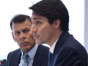 Federal officials are now targeting the fall of 2019 -- right around the time of the next scheduled federal election -- to unveil the final set of regulations, at which time groups who have pushed to end unpaid internships will find out when the rules come into force. Canadian Labour Congress president Hassan Yussuff looks on as Prime Minister Justin Trudeau speaks at the Labour 7 Consultation in Ottawa on Wednesday, April 4, 2018.