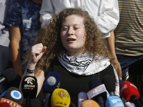 Ahed Tamimi speaks during a press conference on the outskirts of the West Bank village of Nabi Saleh near the West Bank city of Ramallah, Sunday, July 29, 2018.