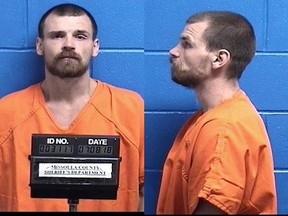 This Sunday, July 8, 2018 booking photo provided by the Missoula County Jail shows suspect Francis Crowley, who was being held on $50,000 bail on a charge of criminal endangerment. On Saturday, July 7, the Missoula County Sheriff's deputies were called about a man threatening people in the Lolo Hot Springs area of the Lolo National Forest. Deputies apprehended Crowley, who indicated that a baby was buried somewhere in the woods. The authorities after searching found a 5-month-old infant who survived more than nine hours being buried under a pile of sticks and debris in the woods of western Montana who suffered only minor injuries. (Missoula County Jail via AP)