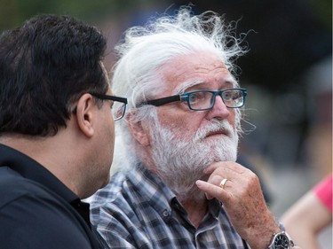 Ovidio Sbrissa, owner of Magee House, looks on as the initial stage of demolition for the heritage house begun on Friday night with crews taking down the south west corner of the building hoping that would be enough to make the building stable enough and the street could be opened to traffic. No decision has been made on whether restoration is a solution or complete demolition.   Photo by Wayne Cuddington/ Postmedia