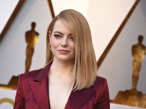 FILE - In this March 4, 2018, file photo, Emma Stone arrives at the Oscars in Los Angeles. Emma Stone plays Annie Landsberg and Jonah Hill plays Owen Milgrim in "Maniac," about a radical kind of pharmaceutical treatment with no complications or side-effects whatsoever. Things do not go as planned.