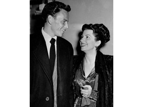 FILE - In this Oct. 23, 1946 file photo, singer Frank Sinatra and his wife Nancy smile broadly as they leave a Hollywood night club following a surprise meeting. Nancy Sinatra Sr., the childhood sweetheart of Frank Sinatra who became the first of his four wives and the mother of his three children, has died. She was 101. Her daughter, Nancy Sinatra Jr., tweeted that her mother died Friday, July 13, 2018. (AP Photo/File)