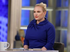This image released by ABC shows Meghan McCain on the set of "The View," in New York. McCain brings a feisty spirit to the conservative commentator role where predecessors frequently seemed overmatched and overlooked. She often reflects the views of President Trump's supporters at a table and city where they are deeply unpopular.