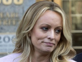 FILE - In this April 16, 2018, file photo, adult film actress Stormy Daniels speaks outside federal court, in New York. Glendon Crain, the husband of porn film performer Stormy Daniels, filed for divorce in Texas, on July 18, 2018. Daniels, whose real name is Stephanie Clifford, claims to have had sex with Donald Trump before he became president, something Trump has denied. Crain alleged adultery as grounds for the divorce.