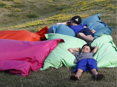 Music fans during opening night at the Ottawa Bluesfest in Ottawa Thursday July 5, 2018. Some fans cooled off inside the War Museum Thursday.  Tony Caldwell