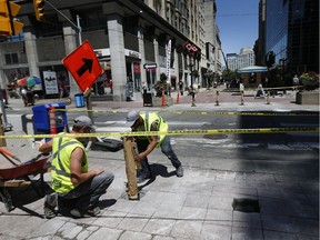 New bollards have been installed by Ontario Bollards to keep vehicles off the Sparks Street pedestrian mall in Ottawa Wednesday July 4, 2018.  Tony Caldwell