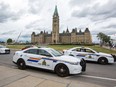 This file photo show the Ceremonial Guard leaving Parliament Hill.