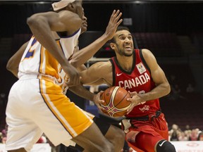 Former Raven Phil Scrubb drives to the basket for Canada against U.S. Virgin Islands during the first quarter of Monday's game in Ottawa. Errol McGihon/Postmedia