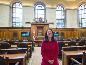 Montreal Mayor Valerie Plante stands in her city's council chamber. Would Montreal's party structure make sense in our civic elections?