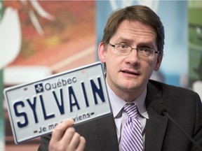 Quebec Transport Minister Sylvain Gaudreault announces the option to have personalized license plates, Thursday, January 30, 2014 in Quebec City.