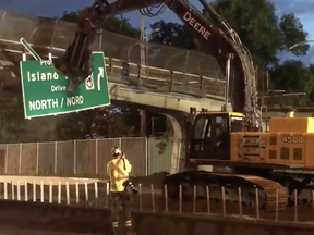 The Harmer Avenue Pedestrian Bridge, built in 1963 is demolished Saturday, July 28, 2018. 
Photo: Jeff Leiper/Twitter